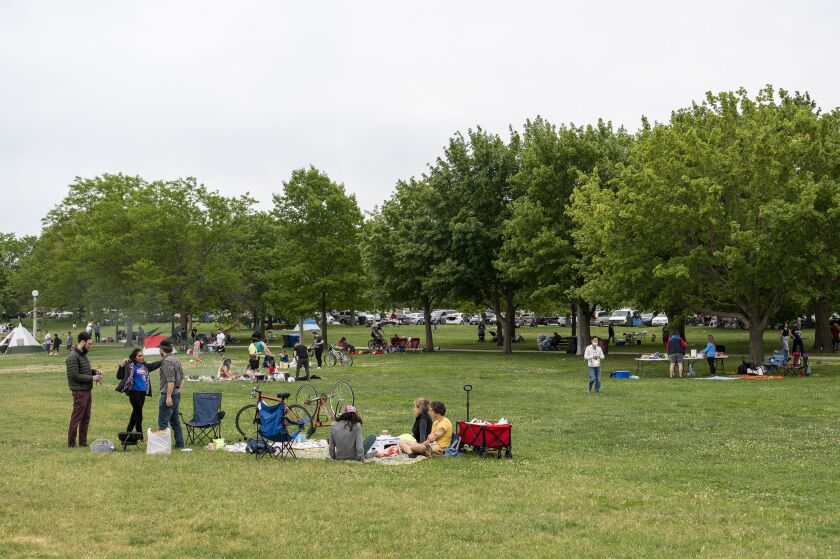 The sand isn’t the only lure at Montrose Beach on. Memorial Day; some preferred hanging out on the grass for a picnic on Monday, May 31, 2021.