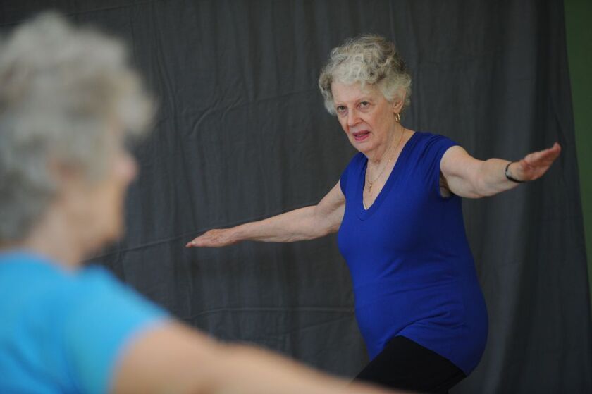 Instructor Sharon Steffensen (left) conducts “Grandma Yoga” class for seniors at the Chicago School of Yoga, 2442 N. Lincoln Ave. Monday, Aug. 6, 2018. | Victor Hilitski/For the Sun-Times
