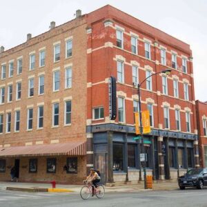 The former Natalinos’ building at 1523 W. Chicago Ave. aims to reopen this summer with 15 apartments upstairs and a new retail or restaurant anchor. | Alisa Hauser/For the Sun-Times