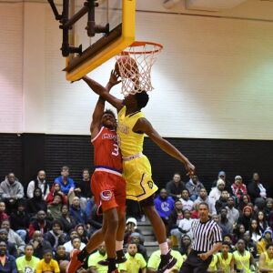 Orr’s Greg Outlaw (0) fouls Curie’s DaJuan Gordan (3). Worsom Robinson/For the Sun-Times.