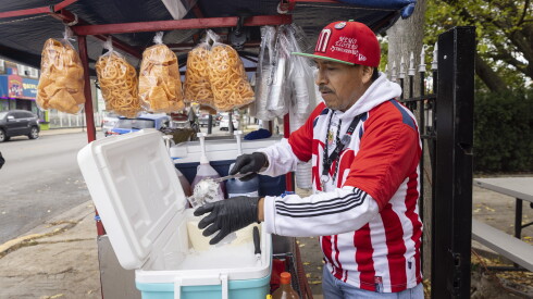 Guillermo Flores tends to customers.