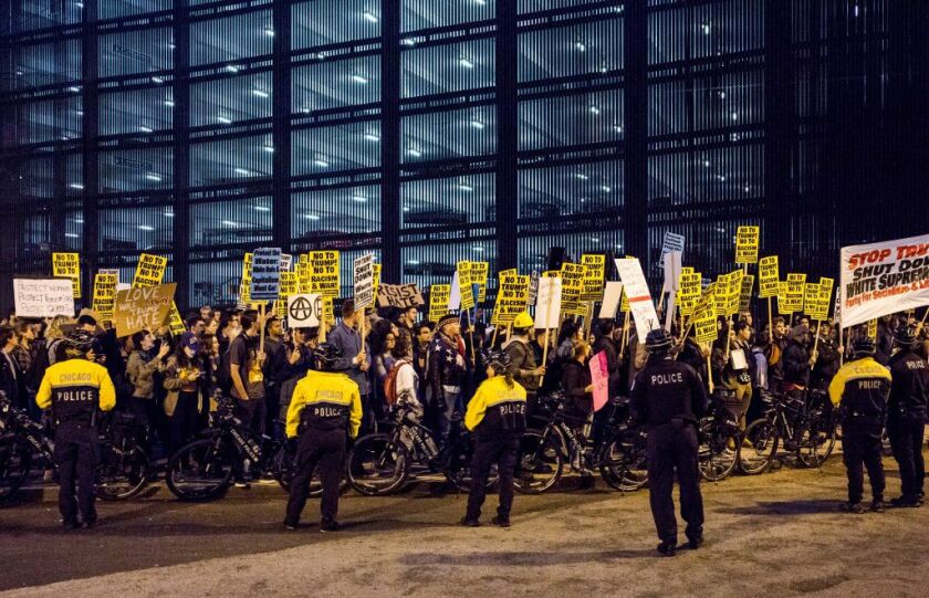 Protesters outside Trump Tower on Wednesday evening in Chicago. | Santiago Covarrubias/Sun-Times