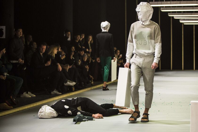 Models present fashion from the Fall/Winter 2015 collection of Danish design house Han Kjobenhavn during the Copenhagen Fashion Week, in Copenhagen, Denmark, January 28, 2015. SIMON LAESSOE/AFP/Getty Images