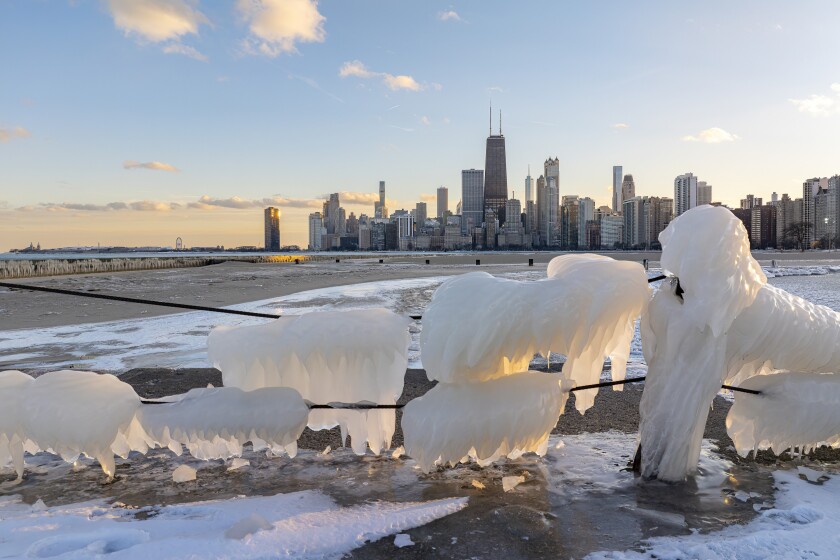 Ice cakes the tip of the North Avenue Beach Pier on Thursday.