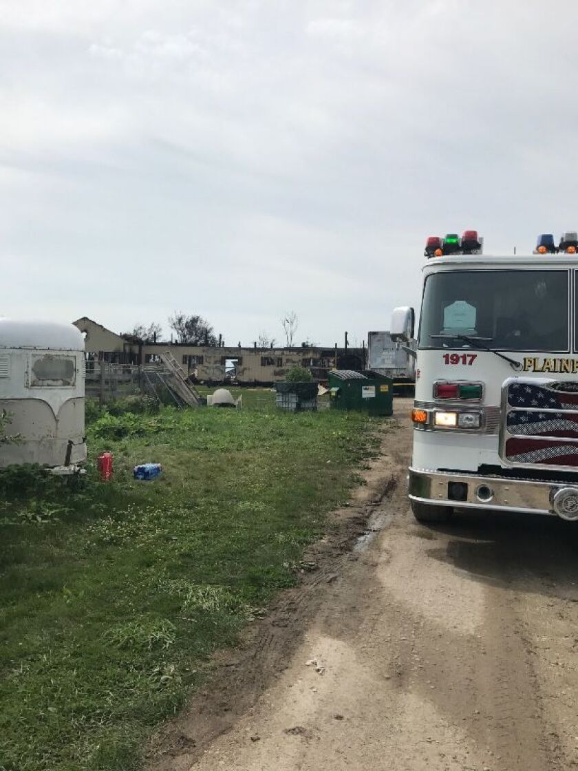 Firefighters remained on the scene Thursday morning after a fire destroyed a barn at the Del Real Stables in Plainfield, killing 18 horses. | GoFundMe