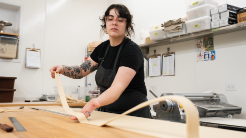 Lou Turner, pastry chef at Milli by Metric, makes croissants inside the kitchen in Avondale, Friday, Oct. 16, 2026.