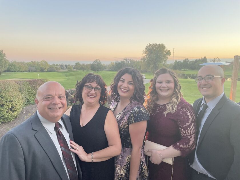 BriElle Munizzi (middle) with her parents and siblings.