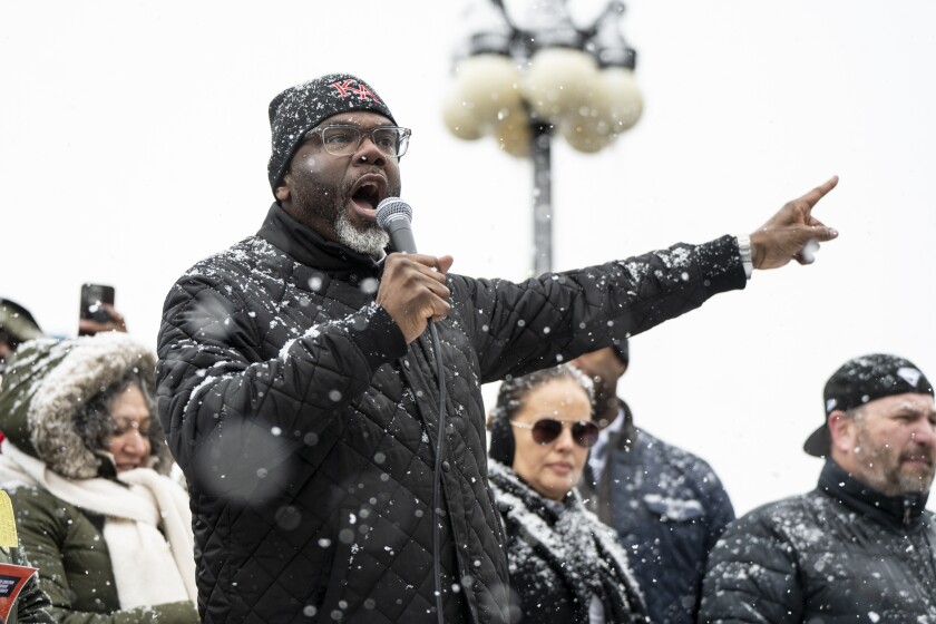 Mayor Brandon Johnson speaks Sunday at a downtown rally against the fatal shooting of Alex Pretti by federal immigration officers in Minneapolis.