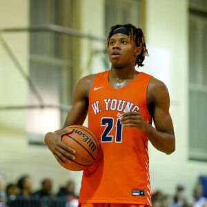 Young’s DJ Steward (21) takes a moment between free throws during the game against Lincoln Park.