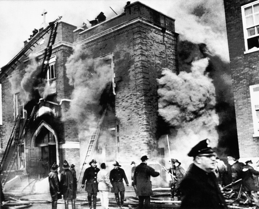In this Dec. 1, 1958 file photo, firefighters battle a fire at the Our Lady of the Angels School in Humboldt Park. The blaze killed 92 children and three nuns.