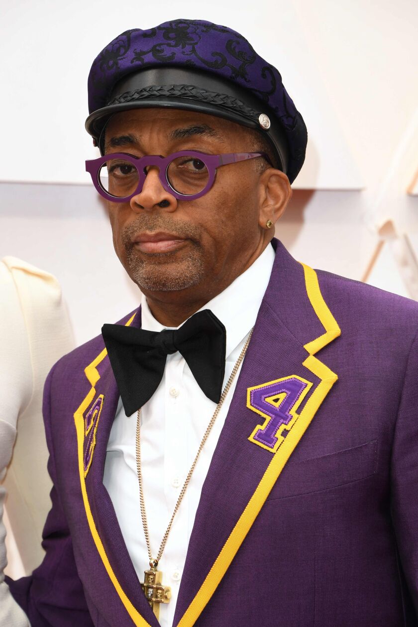Spike Lee arrives at the Academy Awards on Sunday night, wearing a purple and gold tribute to No. 24, Kobe Bryant.
