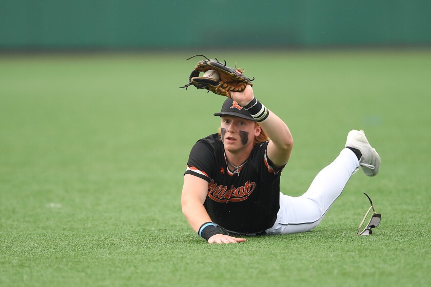 Libertyville's Trevor Wallace (5) Catches the Ball within the Outfield Through the IHSA Class 4a Semfinal Recreation In opposition to Well-liked.