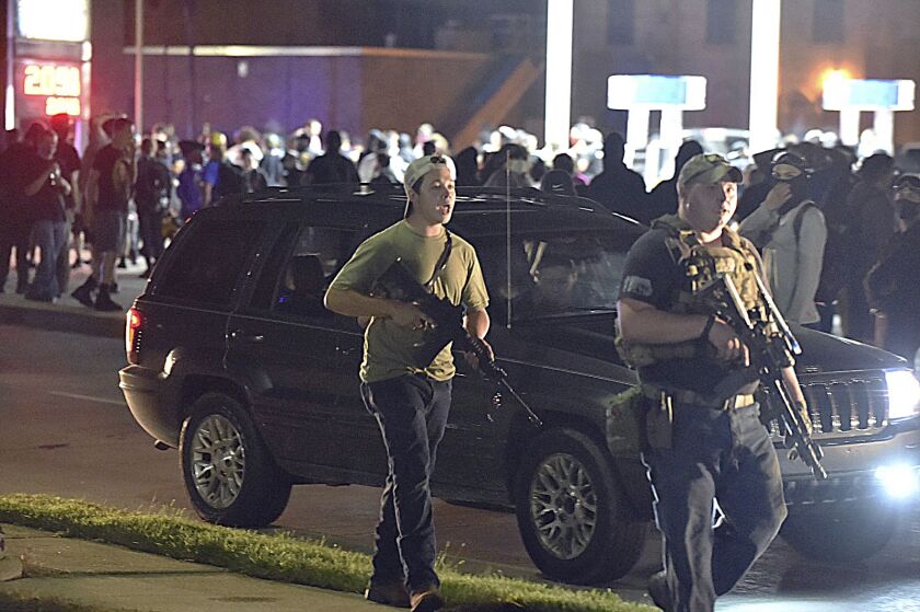 Kyle Rittenhouse (left) is on trial for the shooting of three people during protests in Kenosha, Wisconsin, on Aug. 25, 2020.