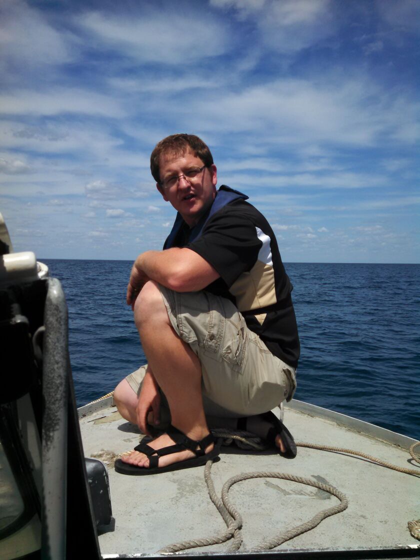Jay Beugly of the Illinois-Indiana Sea Grant watches as the anchor for a new weather buoy is prepped for dropping off Wilmette.<br>Credit: Dale Bowman