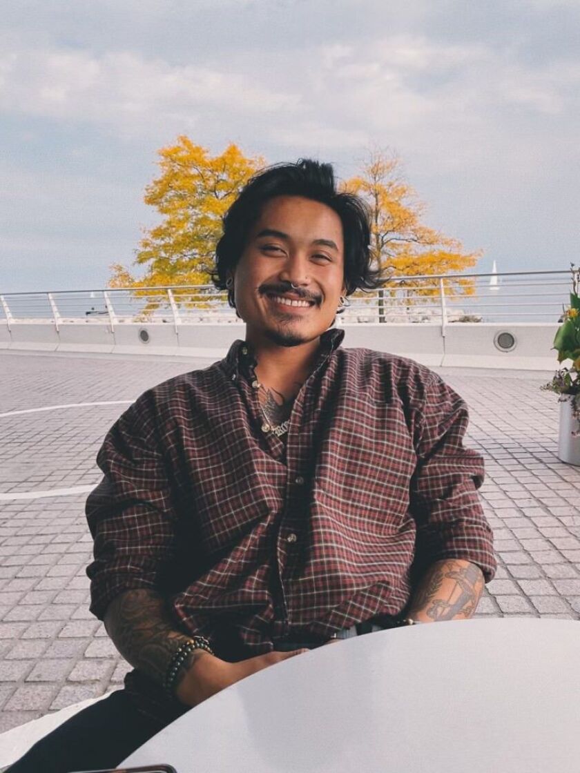 Reddor Santiago, 27, one of the artists who worked on the mural at Lake and Peoria streets, said it was the encouragement of his family and friends that pushed him to become an artist. He incorporates parts of his childhood into his art style.