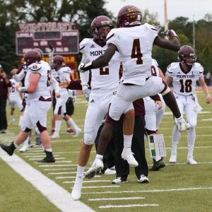 Montini’s Matthew Ross (4) and Mark Gabriel (2) celebrate. Allen Cunningham/For the Sun-Times.