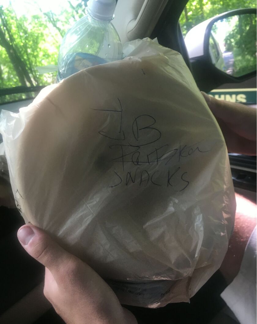 A bag of garbage labeled “JB Pritzker snacks” that was thrown at Gov. J.B. Pritkzer’s Lake Geneva house.