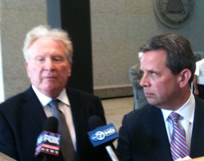 Michael Segal (left) in 2012 with his attorney, Marc Martin, after Segal’s early release. | Sun-Times files
