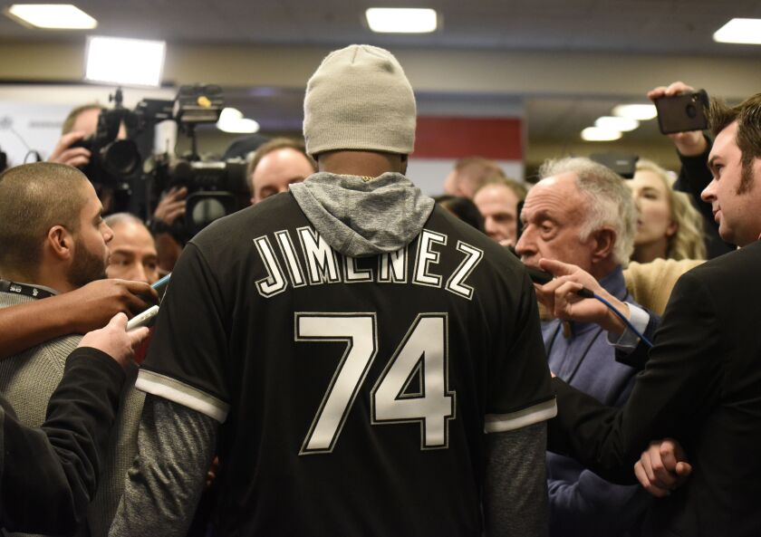Eloy Jimenez with reporters.