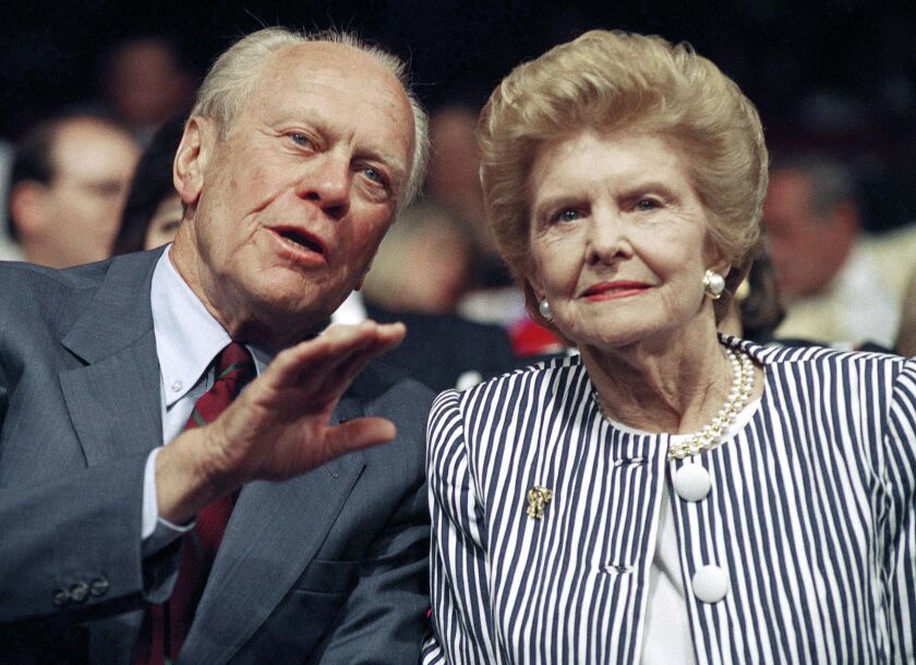 In this Aug. 19, 1992 file photo, former President Gerald R. Ford and his wife Betty Ford watch a session of the Republican National Convention in the Houston Astrodome. | AP Photo/Barry Thumma, File