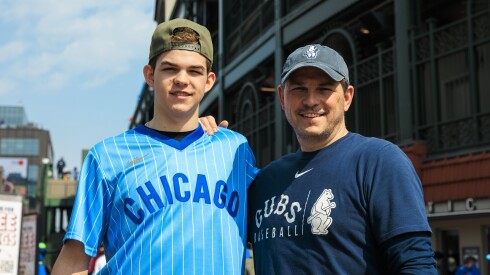 Jerry Evans, 54, and Jake Evans, 17, outside Wrigley Field on the Chicago Cub’s opening day on Thursday.