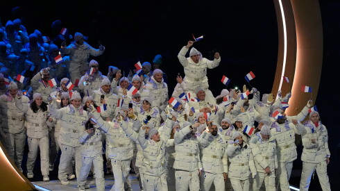 Athletes from France attend the Olympic opening ceremony at the 2026 Winter Olympics, in Milan, Italy, on Friday, Feb. 6, 2026.