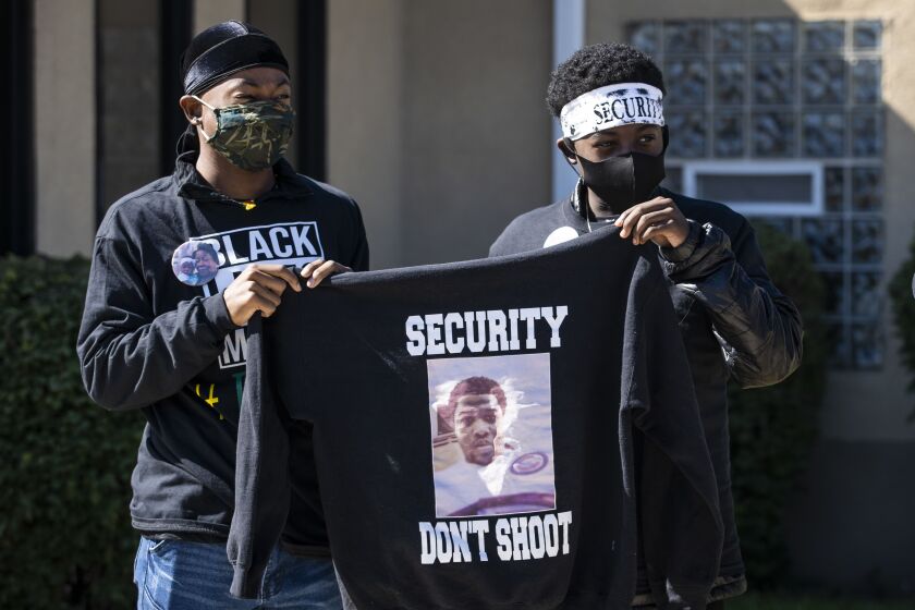 Family and supporters gather for a news conference Friday at a West Side church to discuss the announcement that Cook County State’s Attorney Kim Foxx’s office would not be filing charges in connection with the fatal shooting of Jemel Roberson.