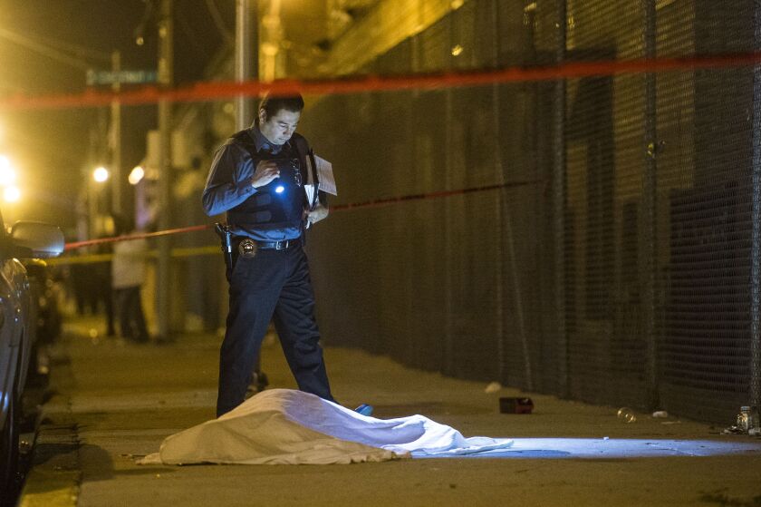 Police investigate a fatal shooting in the 800 block of North Cambridge Avenue | Tyler LaRiviere/Sun-Times