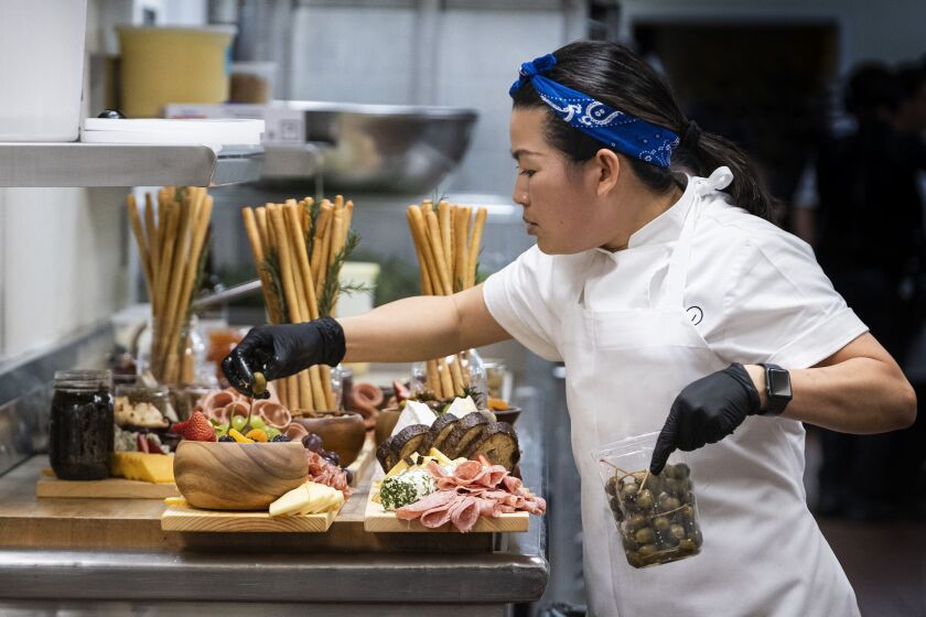 This image released by HBO Max shows Chef Pauline in a scene from the four-part documentary series, “The Event,” which shows the intense planning and details that go into high-profile catering.