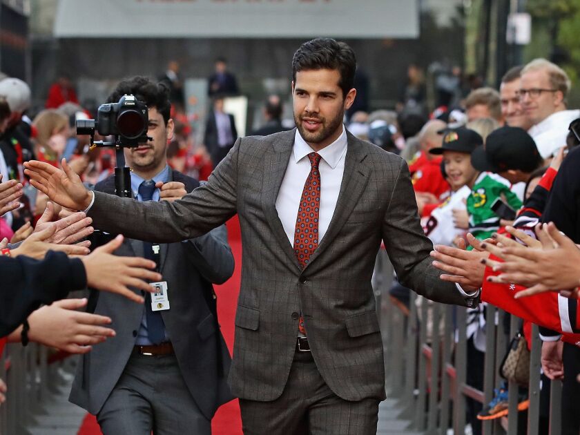 Corey Crawford walks the red carpet before the 2017 season opener. | Jonathan Daniel/Getty Images