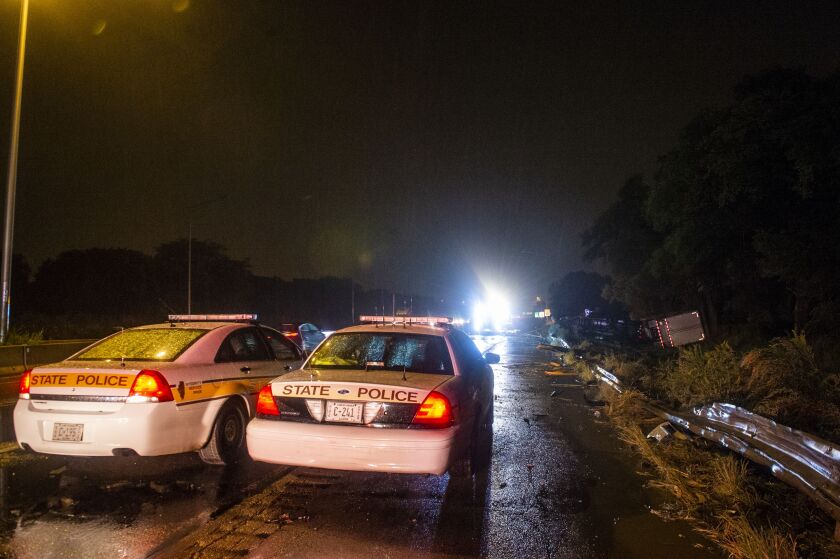 Illinois State Police and Illinois Department of Transportation respond to a Semi Rollover Tuesday morning on the Bishop Ford near 130th Street. | Tyler LaRiviere/Sun-Times