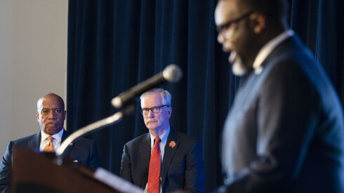 Bears Pres. Kevin Warren and Bears Chairman George McCaskey listen to Chicago Mayor Brandon Johnson as he speaks during a news conference about the proposed Bears stadium at the United Club at Soldier Field, Wednesday, April 24, 2024. | Pat Nabong/Sun-Times