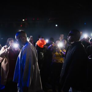 Kanye West walks to the stage during his Sunday Service concert at the Credit Union 1 Arena in Chicago, Sunday, Feb. 16, 2020.