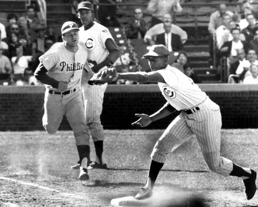 September 6, 1966, Phillies’s Doug Clemens is out at first in eighth inning on grounder to Glenn Beckert. Ernie Banks takes throw as pitcher Ferguson Jenkins backs up play. | Sun-Times library