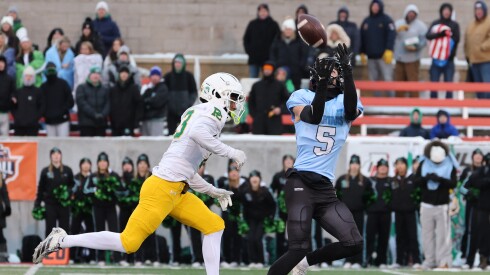 St. Francis's Zach Washington (5) catches a long pass for a big gain against Providence.