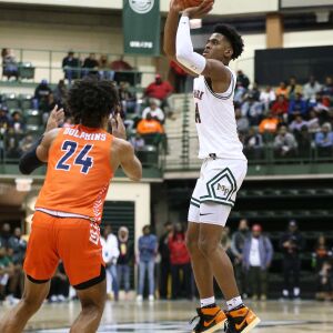 Morgan Park’s Adam Miller (44) puts up a shot against Young.