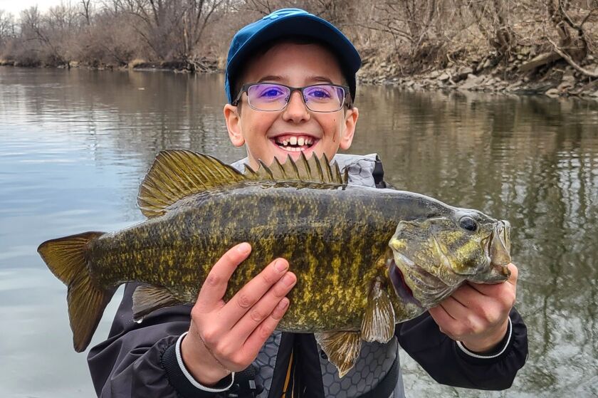 Nick Schmitt with a good smallmouth bass from the DuPage River. Provided photo