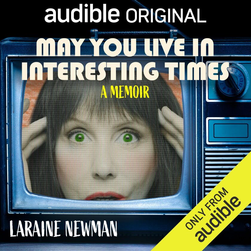 This image released by Audible shows cover art for “May You Live in Interesting Times,” a memoir by Laraine Newman.