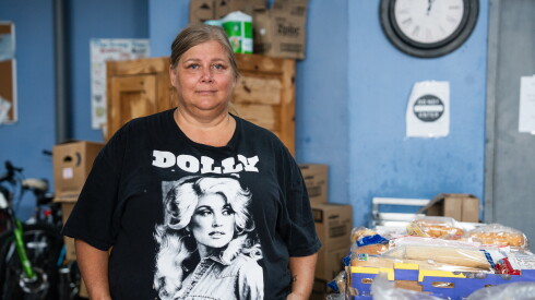 Allison Looney, who said she lost power in her home for 13 days, inside Brother’s Keeper where she volunteers in Gary, Ind., Wednesday, Aug. 26, 2026. Looney said the experience made her reflect on how people came together in the community when power was out.