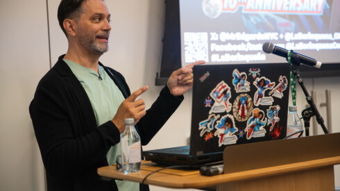 Edgardo Miranda-Rodriguez leads a "create your own superhero" workshop at the Obama Presidential Center.