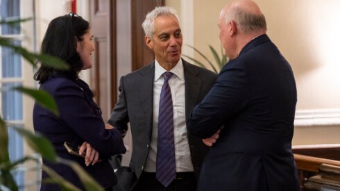 Former mayor Rham Emanuel, center, speaks with Rebecca Darr, president and CEO of the WINGS program, and John Sciaccotta, former Chicago Bar Association president, ahead of a speech Thursday at the Union League Club of Chicago.