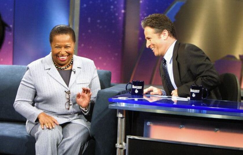 Democratic Presidential candidate Carol Moseley Braun appears with Jon Stewart during “The Daily Show With Jon Stewart” at the Daily Show Studios January 14, 2004 in New York City. (Photo by Scott Gries/Getty Images)