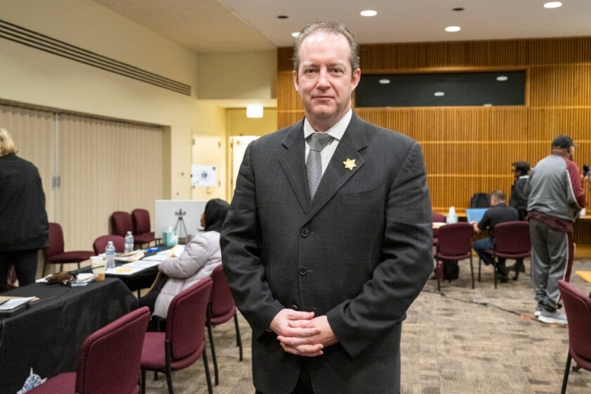Commander Jason Moran with the Cook County Sherif’s Office stands inside the Cook County Medical Examiner’s Office during the fifth Cook County Missing Persons Day at the Cook County Medical Examiner’s Office, Saturday, May 10, 2025, in Chicago.