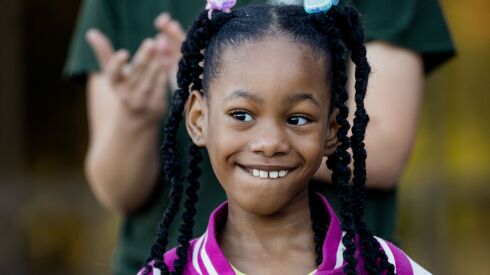 Kourtney Goodall, 6, who received a prosthetic leg at Shriners Children’s Chicago, attended a tree-planting ceremony there Tuesday.