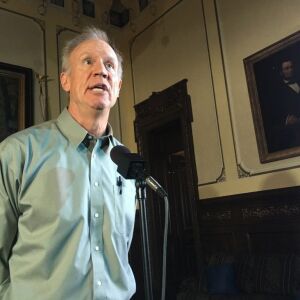 FILE – In this Aug. 9, 2018, file photo, Illinois Gov. Bruce Rauner speaks to the news media in his state Capitol office, in Springfield, Ill. Two weeks after Education Secretary Betsy DeVos called her friend, Gov. Bruce Rauner, in August 2017, the