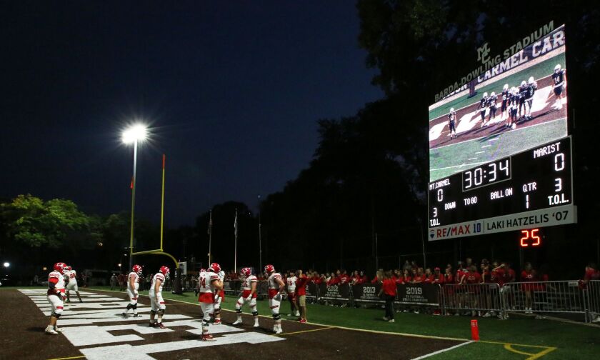 Mount Carmel’s new screen gives the fans the opportunity to see replays during the game.