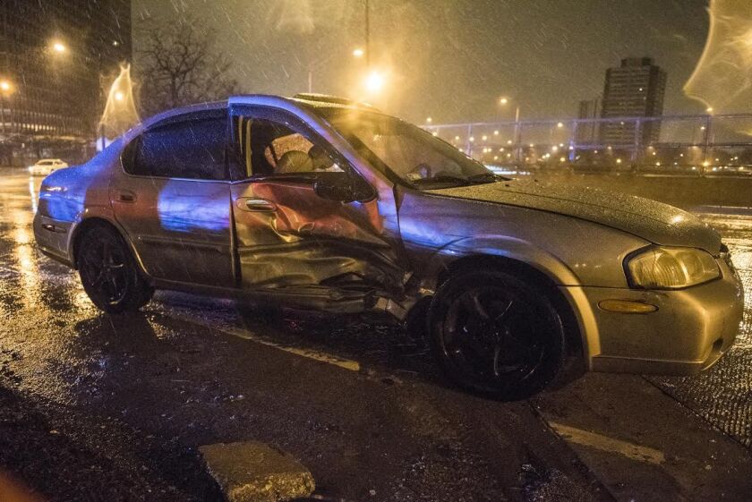 A car rolled over after a hit and run Tuesday morning on the Near West Side. Tyler LaRiviere/Sun-Times