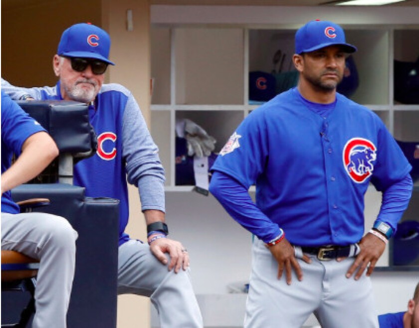 <em>Maddon and longtime bench coach Dave Martinez last season.</em>