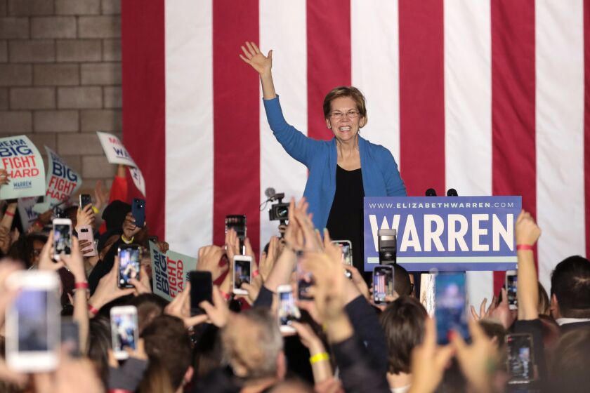 Democratic presidential candidate Sen. Elizabeth Warren speaks to supporters during a rally at Eastern Market on Tuesday in Detroit, Michigan.