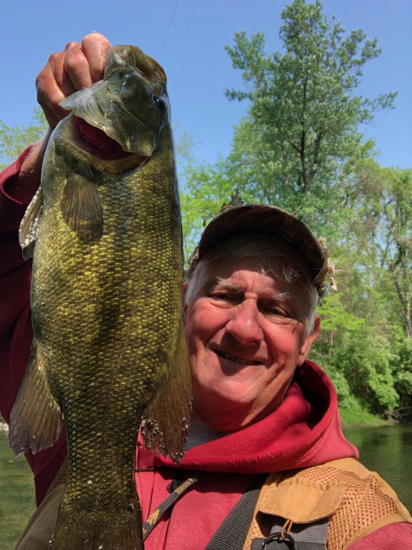 George Peters with a smallmouth bass from the Vermilion River. Provided photo